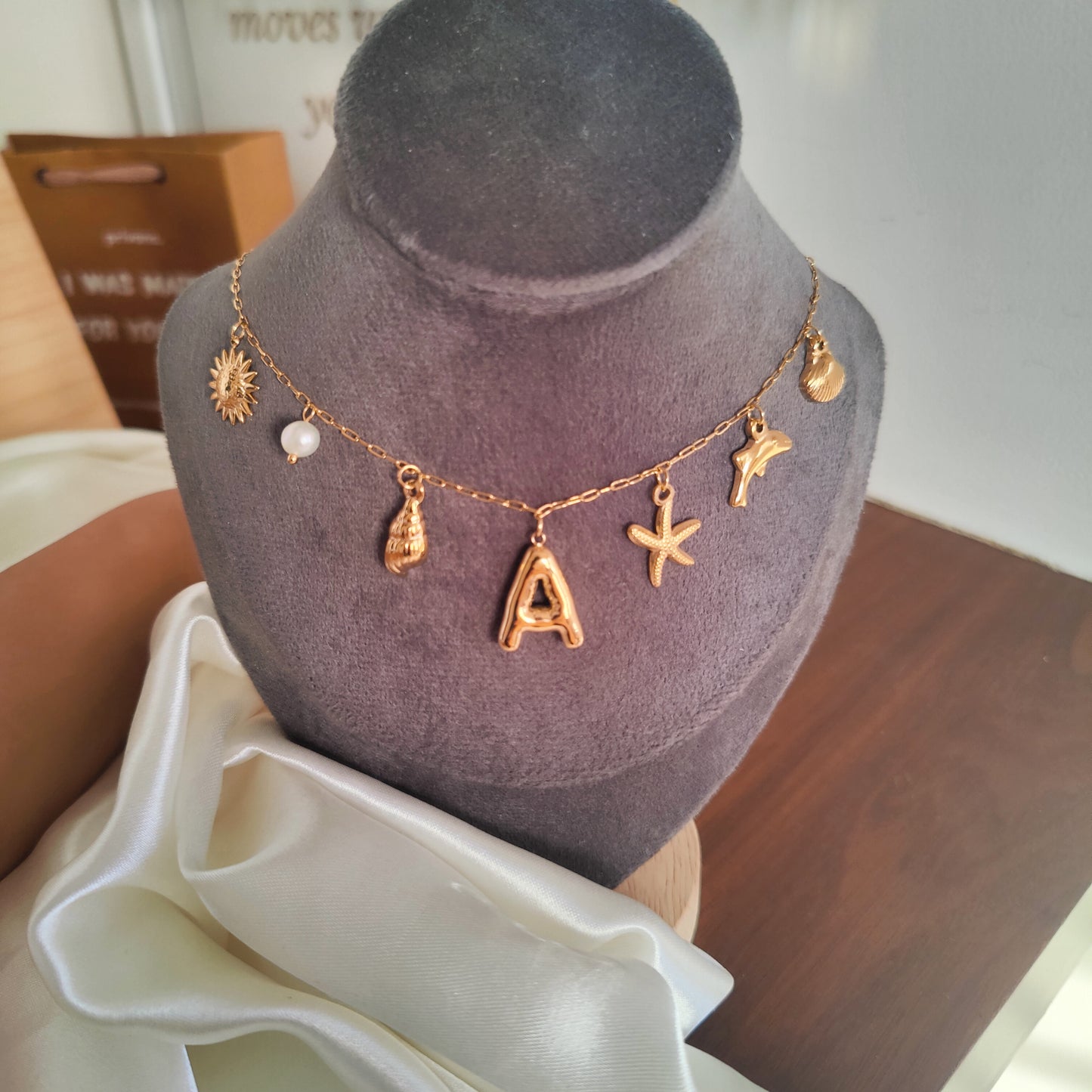 Initial charm necklaces
