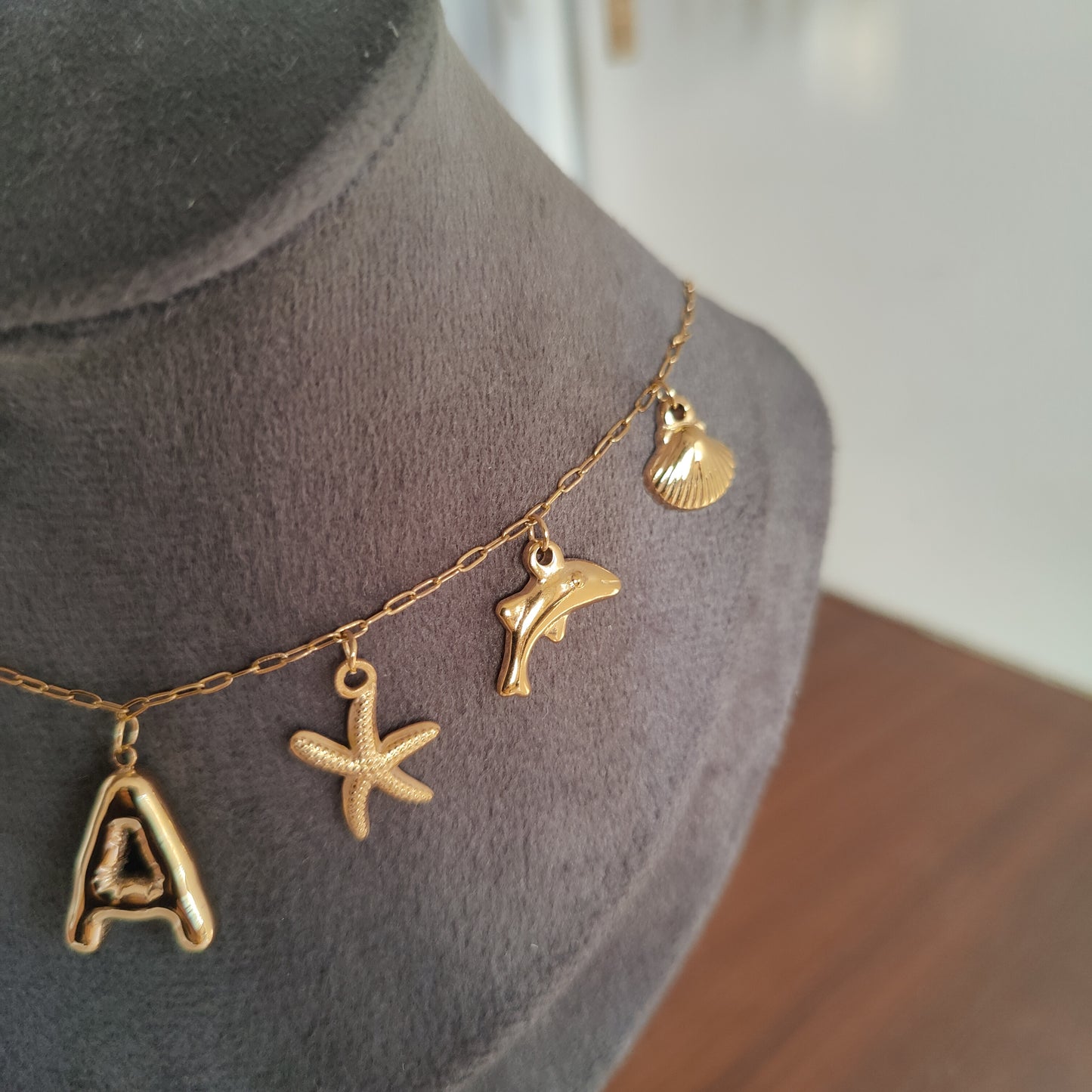 Initial charm necklaces