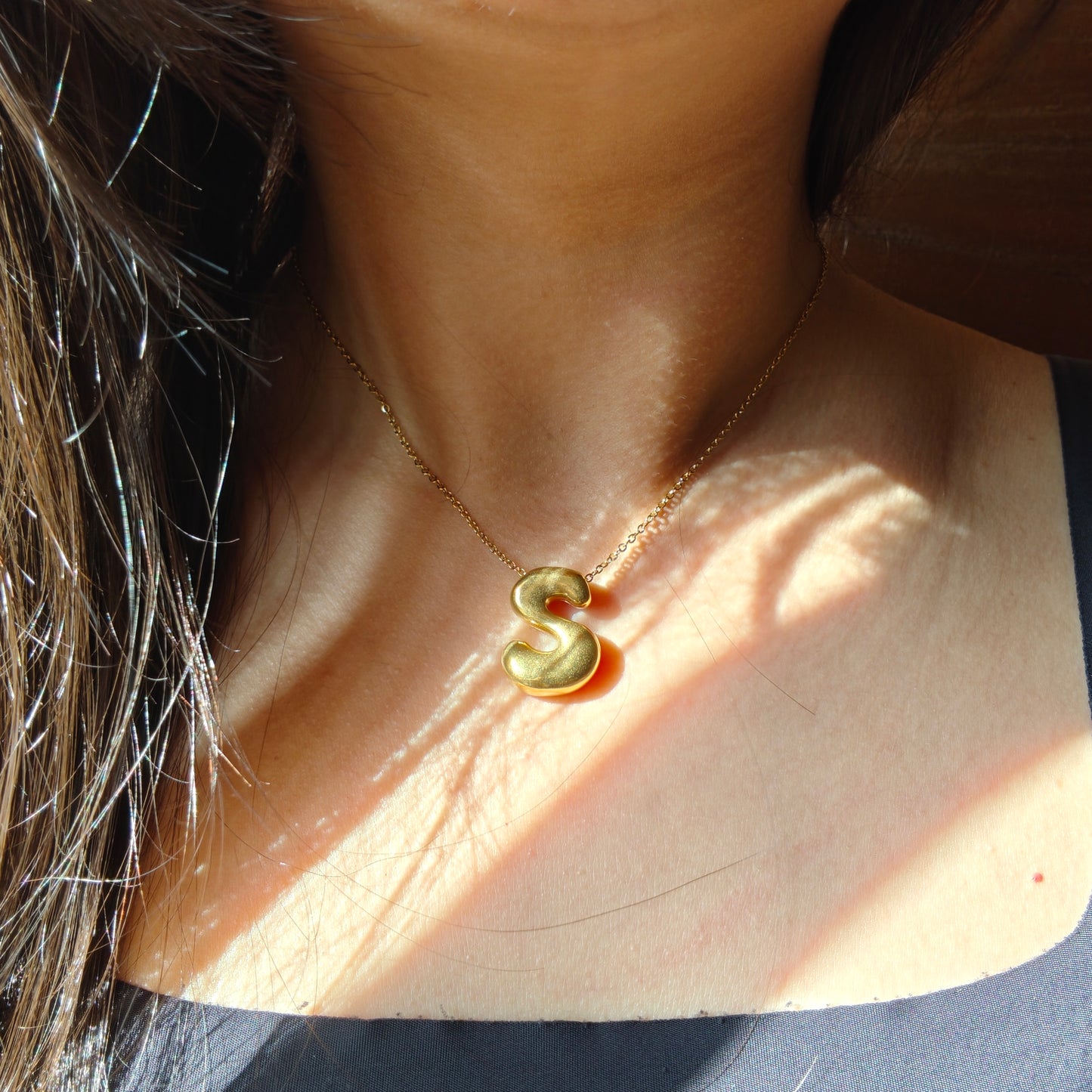 Bubble initial neckpieces
