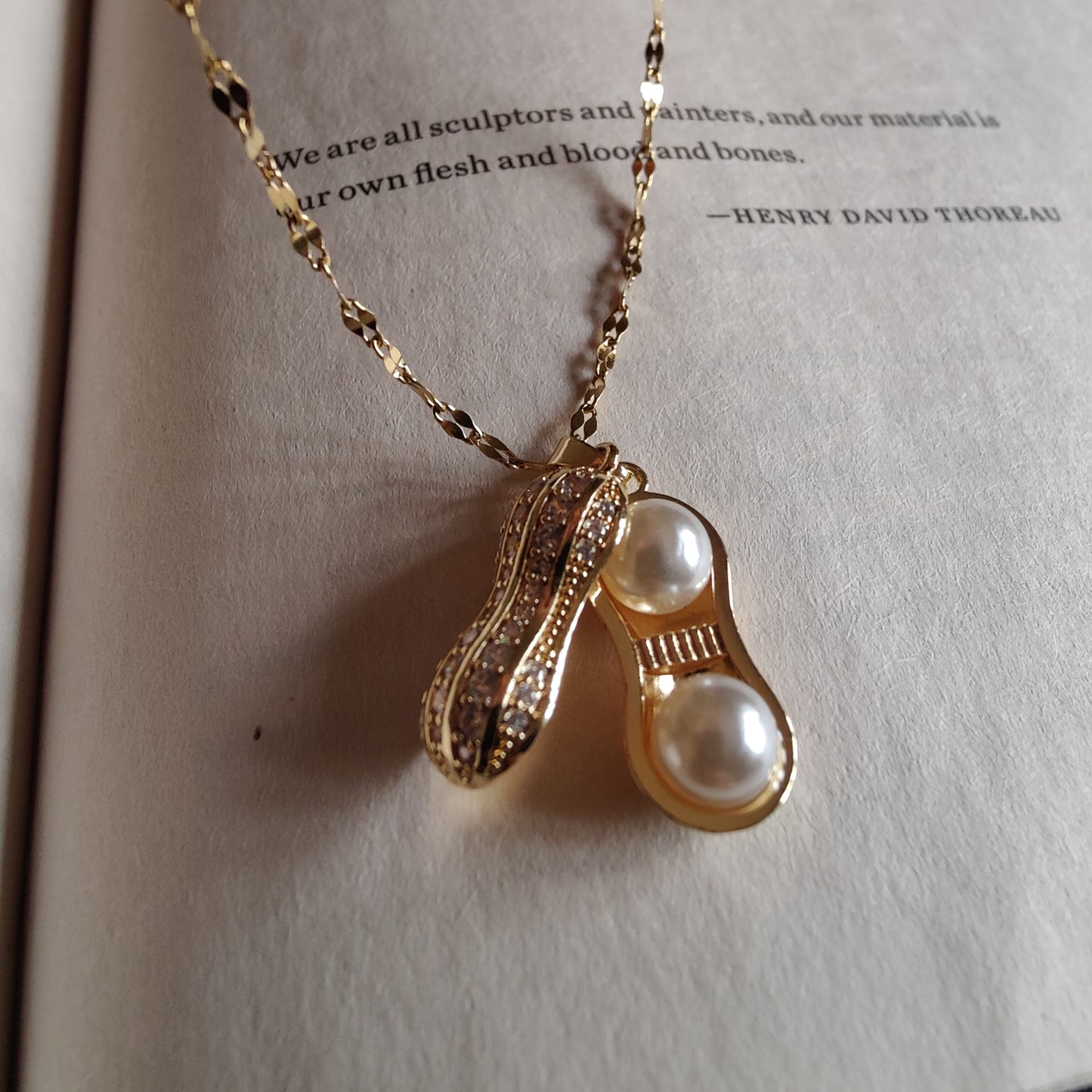 Openable peanut neckpiece