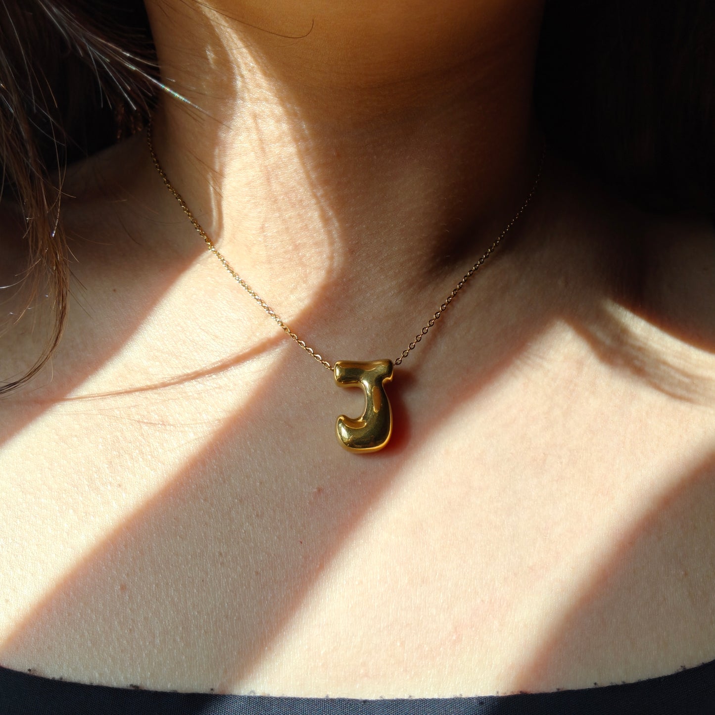 Bubble initial neckpieces