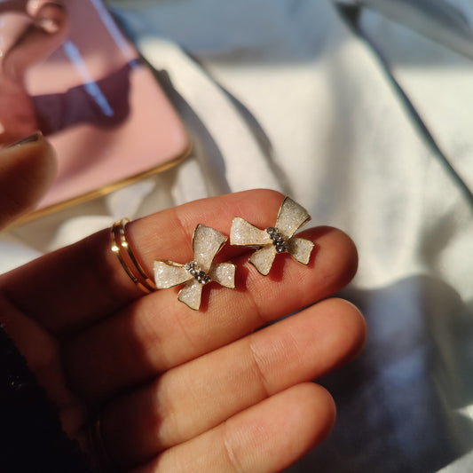 White bow studs
