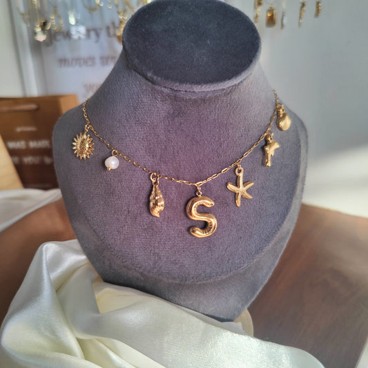 Initial charm necklaces