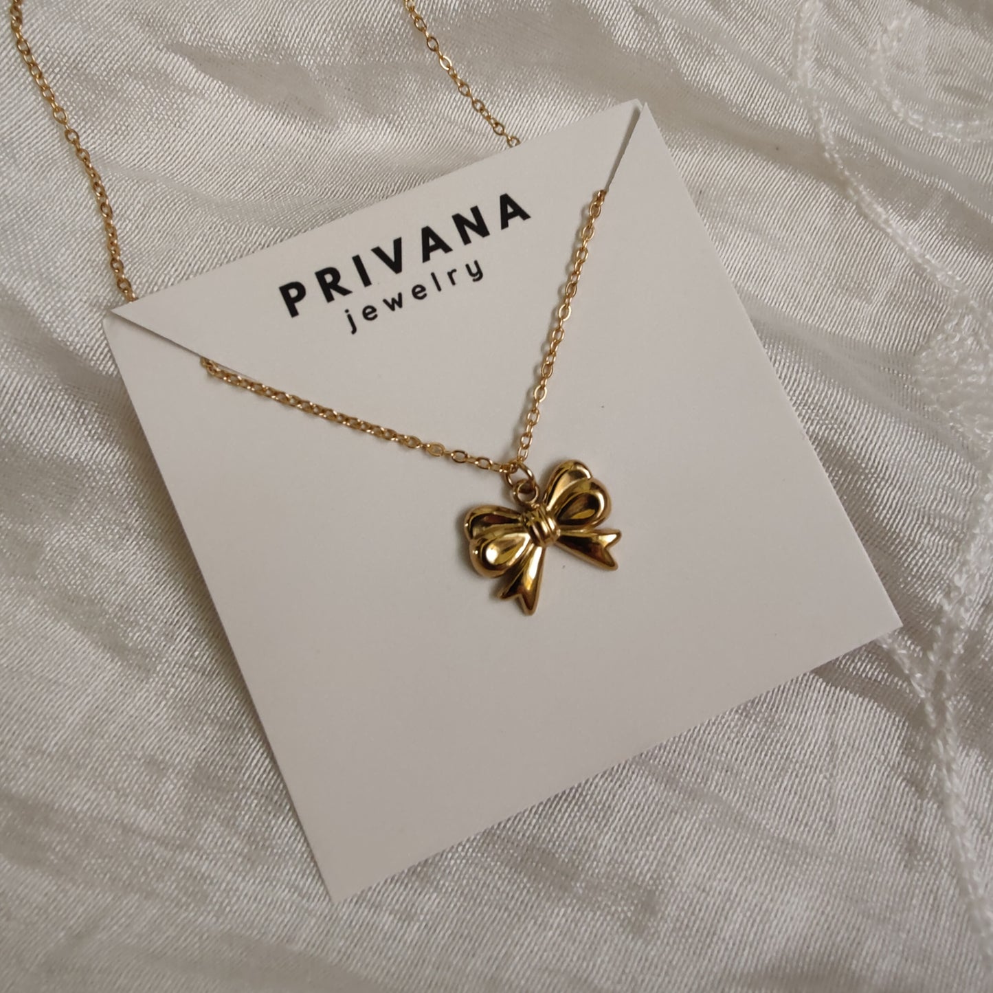 Emmie bow neckpiece