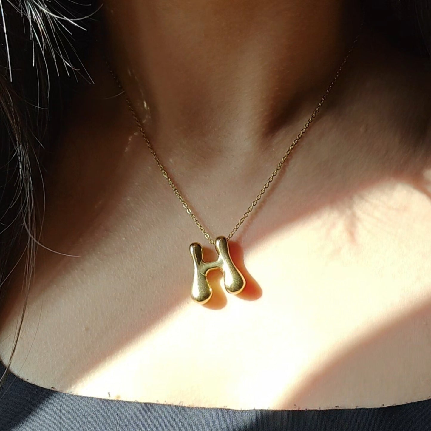 Bubble initial neckpieces