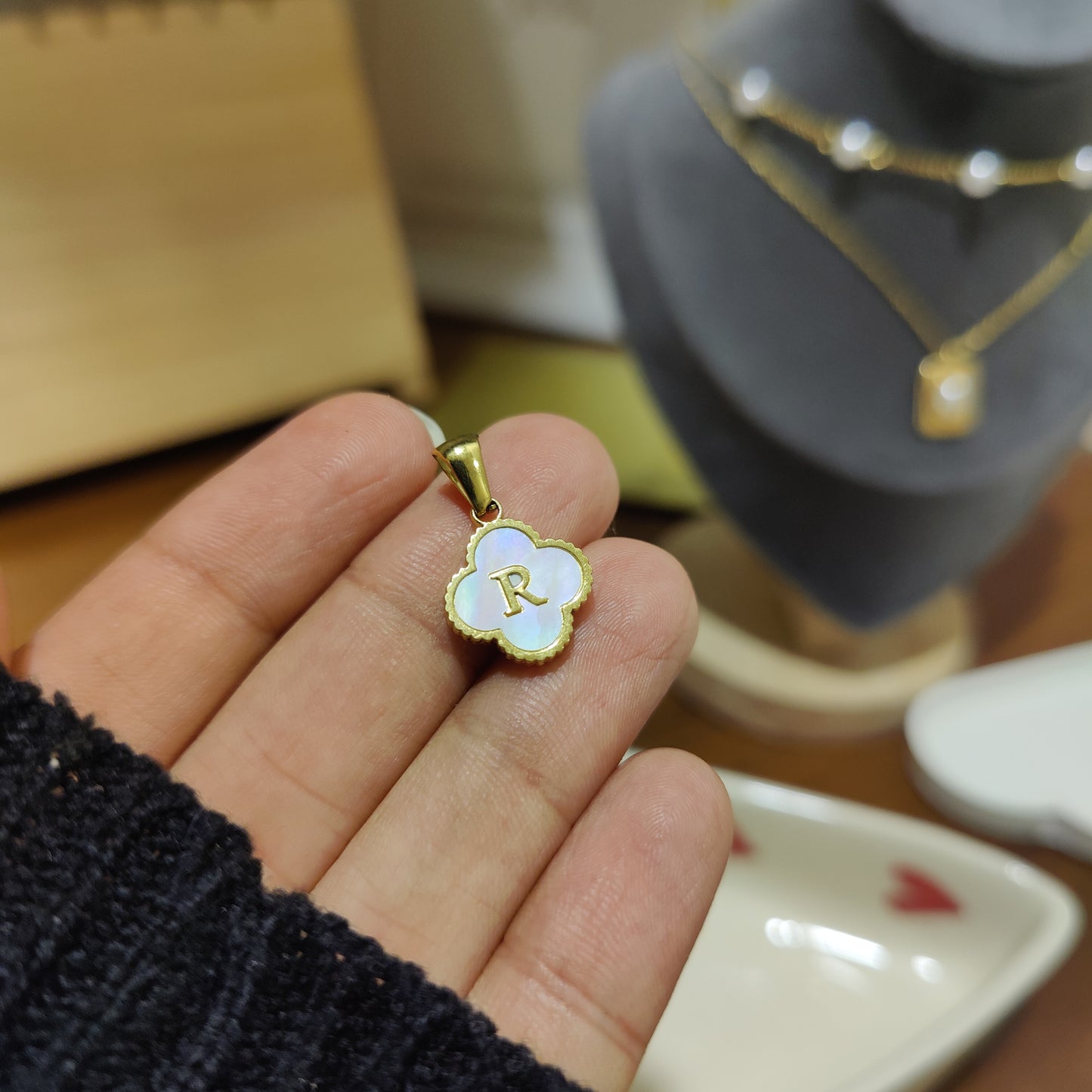 Initial R clover charm
