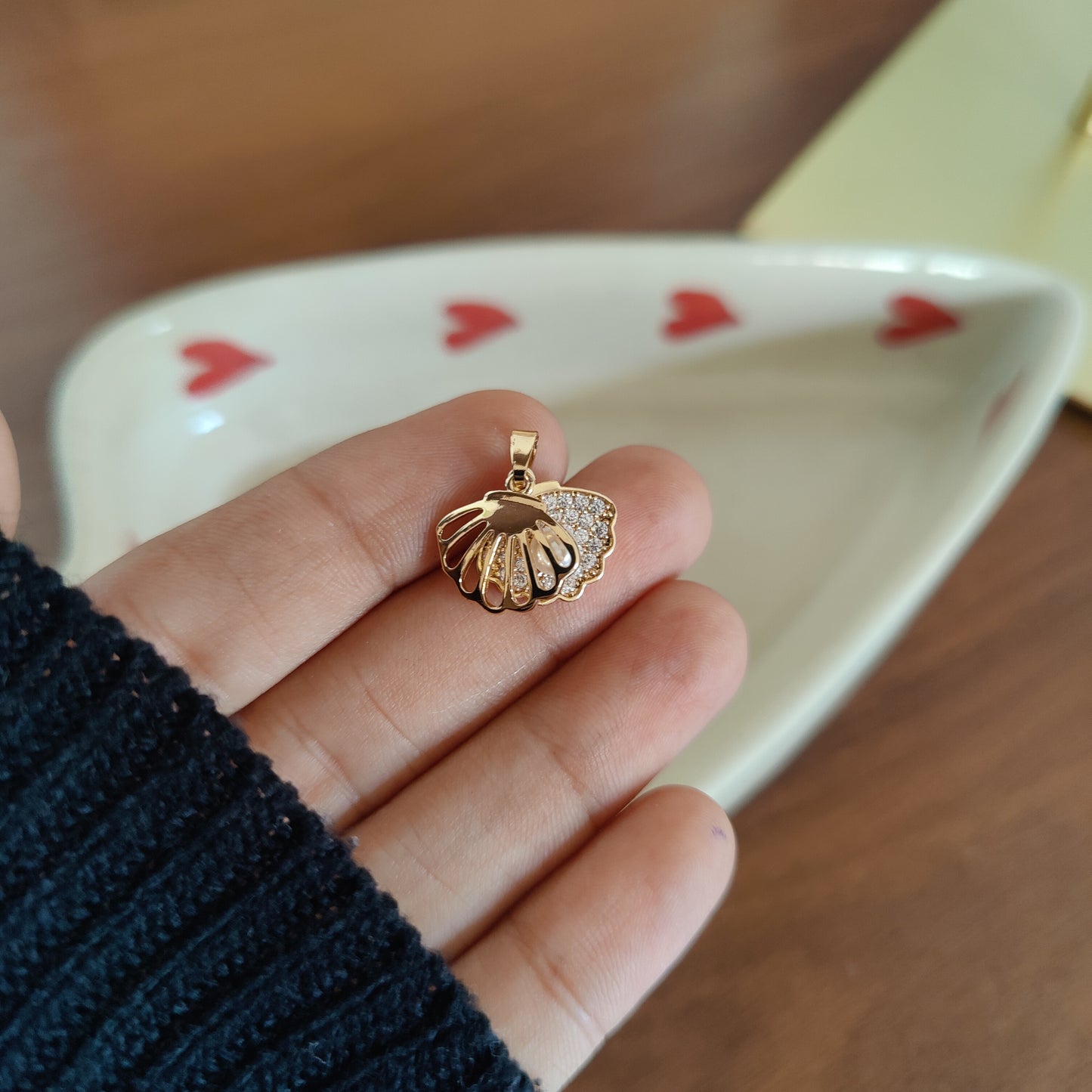 Openable shell charm