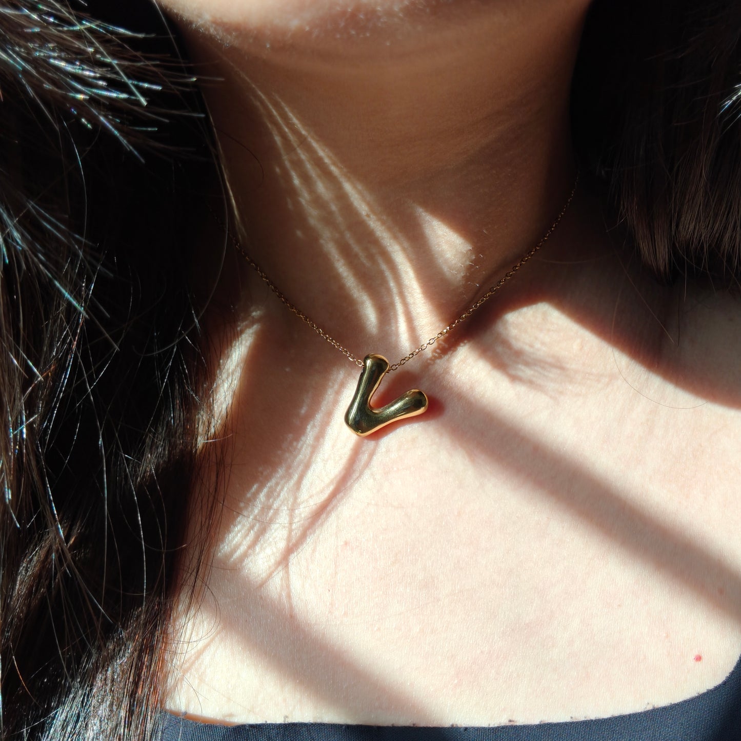 Bubble initial neckpieces