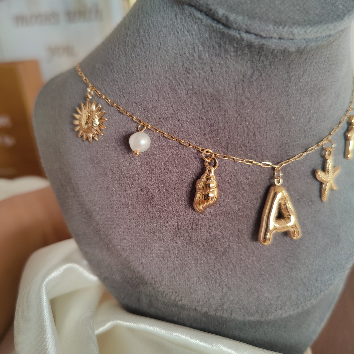 Initial charm necklaces