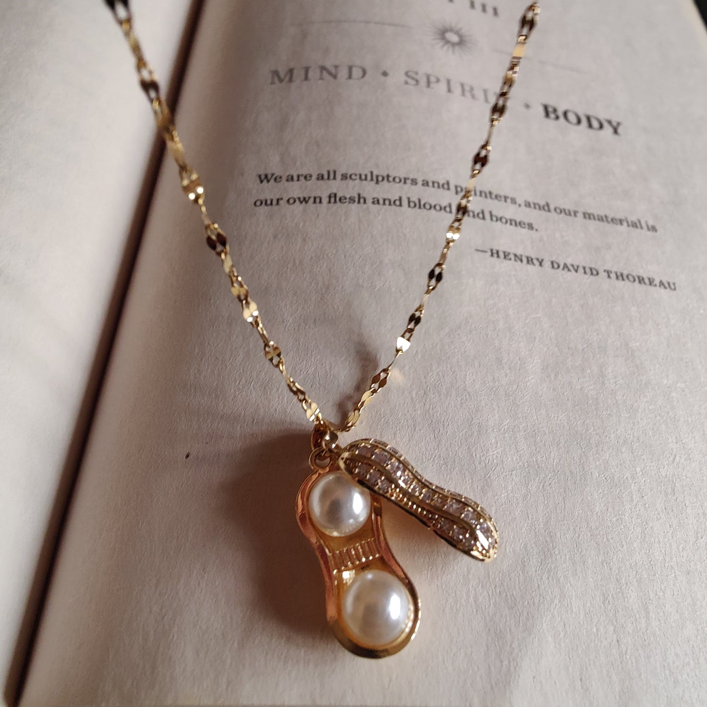 Openable peanut neckpiece